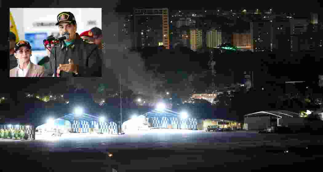 Smoke raises at La Carlota airport after explosions and low-flying aircraft were heard in Caracas, Venezuela, Saturday.