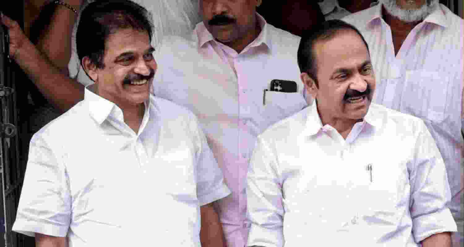 Senior Congress leader K C Venugopal with Kerala (Keralam) Chief Minister-designate V D Satheesan. 