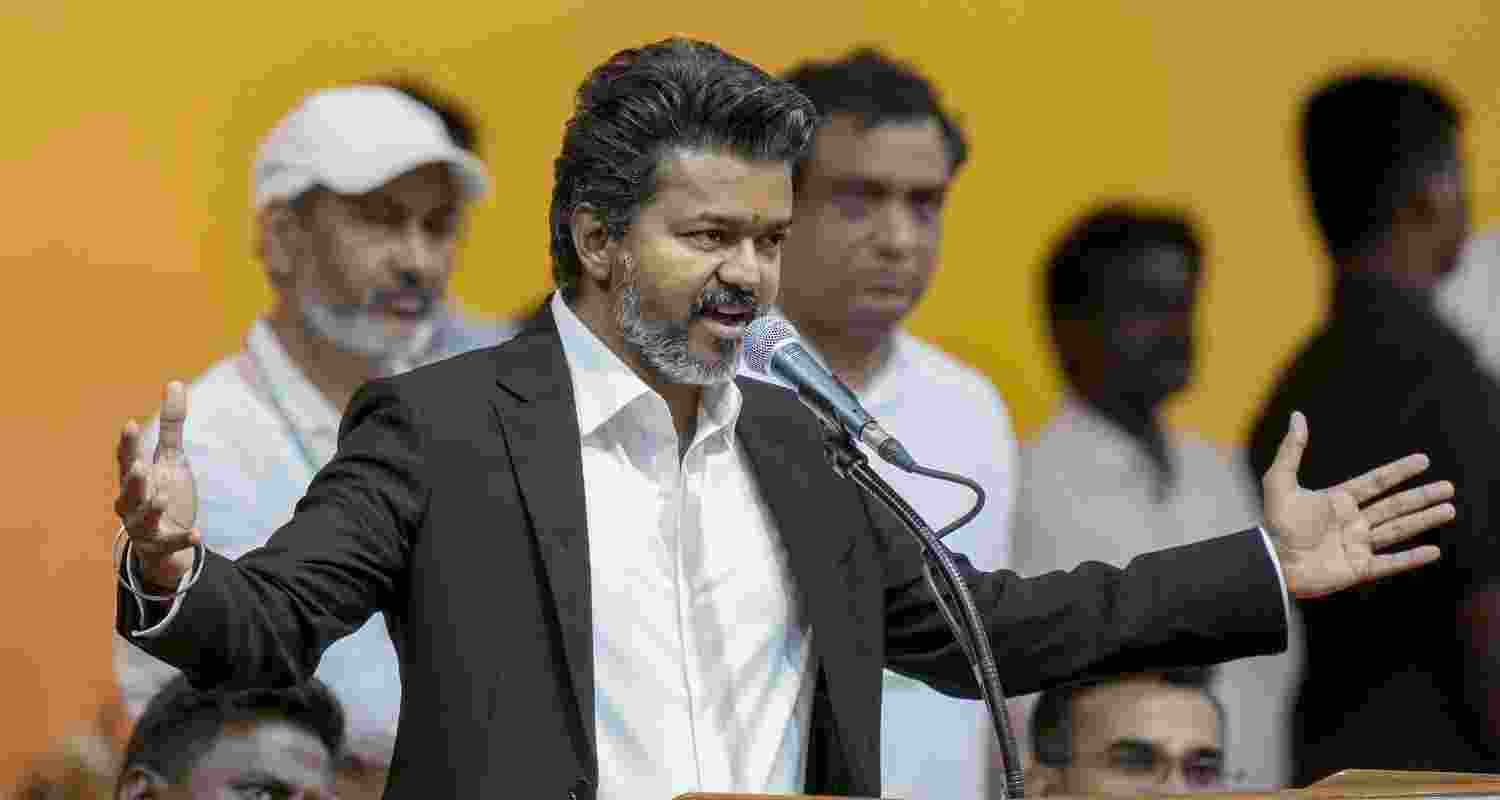 Congress MP and Lok Sabha LoP Rahul Gandhi with Tamilaga Vettri Kazhagam (TVK) chief C Joseph Vijay during the swearing-in ceremony of the latter as the Tamil Nadu Chief Minister, at Jawaharlal Nehru Stadium, in Chennai.