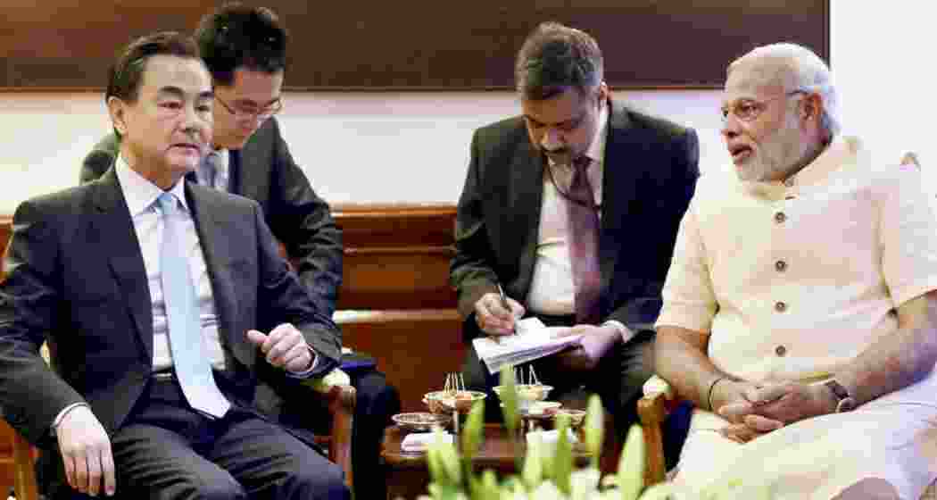Chinese Foreign Minister Wang Yi meets Prime Minister Narendra Modi.
