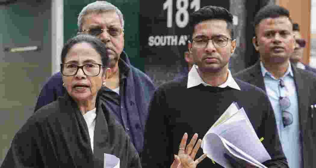 West Bengal CM Mamata Banerjee and TMC MP Abhishek Banerjee, in South Avenue area, New Delhi on Monday.