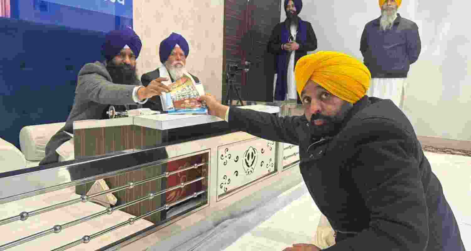 Akal Takht acting Jathedar Giani Kuldeep Singh Gargaj and Jathedar Giani Tek Singh of Takht Sri Damdama Sahib presenting Punjab Chief Minister Bhagwant Mann with a copy of the monthly Gurdwara Gazette and Sikh Code of Conduct in Amritsar on Thursday. Akal Takht acting Jathedar Giani Kuldeep Singh Gargaj and Jathedar Giani Tek Singh of Takht Sri Damdama Sahib presenting Punjab Chief Minister Bhagwant Mann with a copy of the monthly Gurdwara Gazette and Sikh Code of Conduct in Amritsar on Thursday.