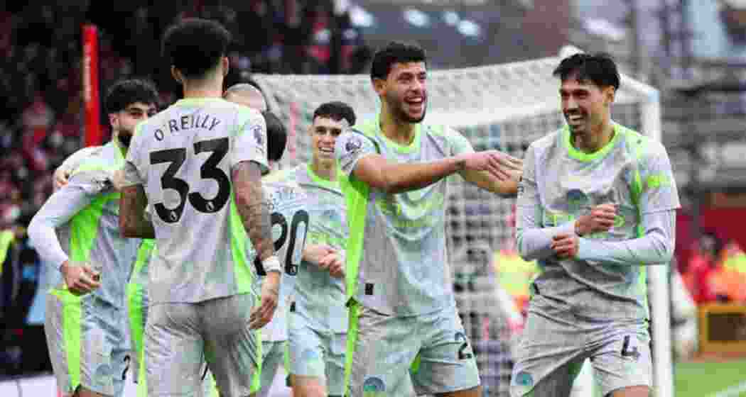 Arsenal’s players celebrate after scoring against Brighton. Arsenal’s players celebrate after scoring against Brighton.