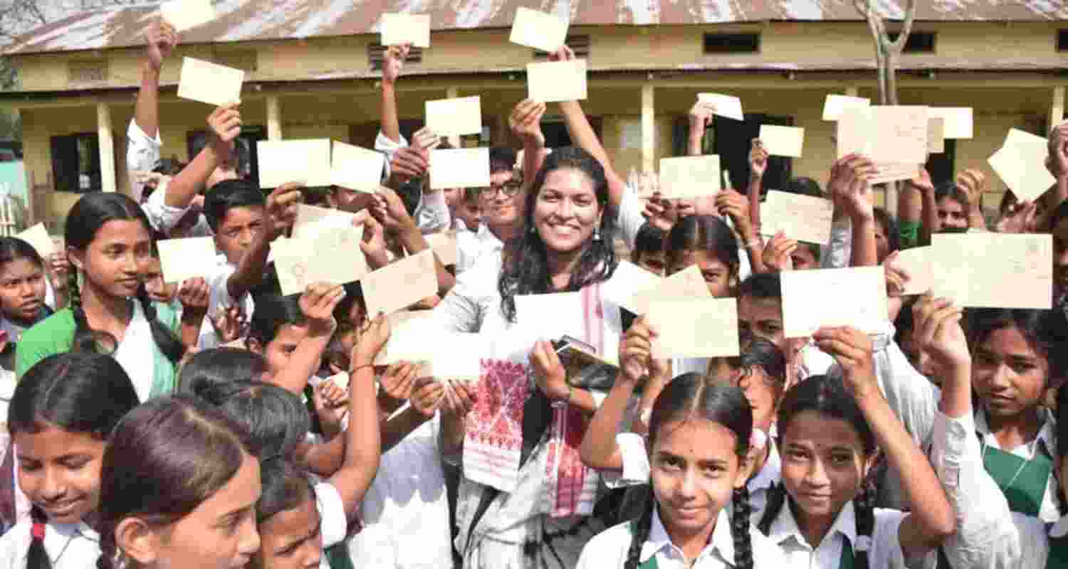 Students in Assam showcase postcards addressed to their parents, urging them to vote. Students in Assam showcase postcards addressed to their parents, urging them to vote.