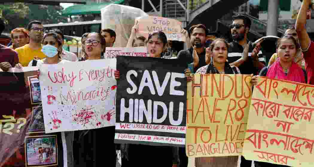 Hindus block an intersection as they protest against violence towards their community in capital city Dhaka. Hindus block an intersection as they protest against violence towards their community in capital city Dhaka.