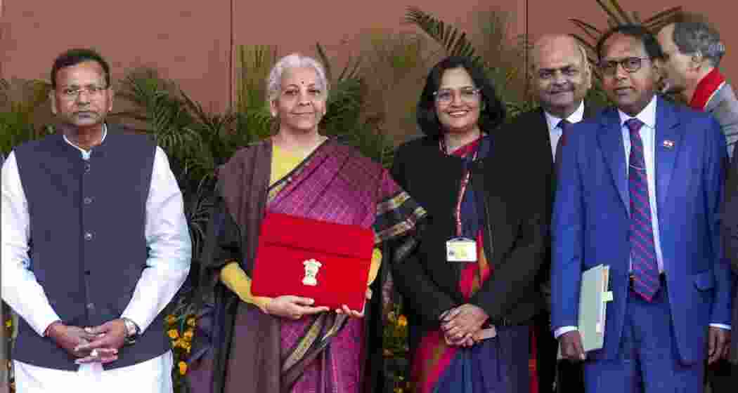 Finance Minister Nirmala Sitharaman poses with her Budget team, and senior officials of the Ministry of Finance, outside Kartavya Bhavan before heading to Rashtrapati Bhavan and Parliament to present the Union Budget 2026-27. Finance Minister Nirmala Sitharaman poses with her Budget team, and senior officials of the Ministry of Finance, outside Kartavya Bhavan before heading to Rashtrapati Bhavan and Parliament to present the Union Budget 2026-27.
