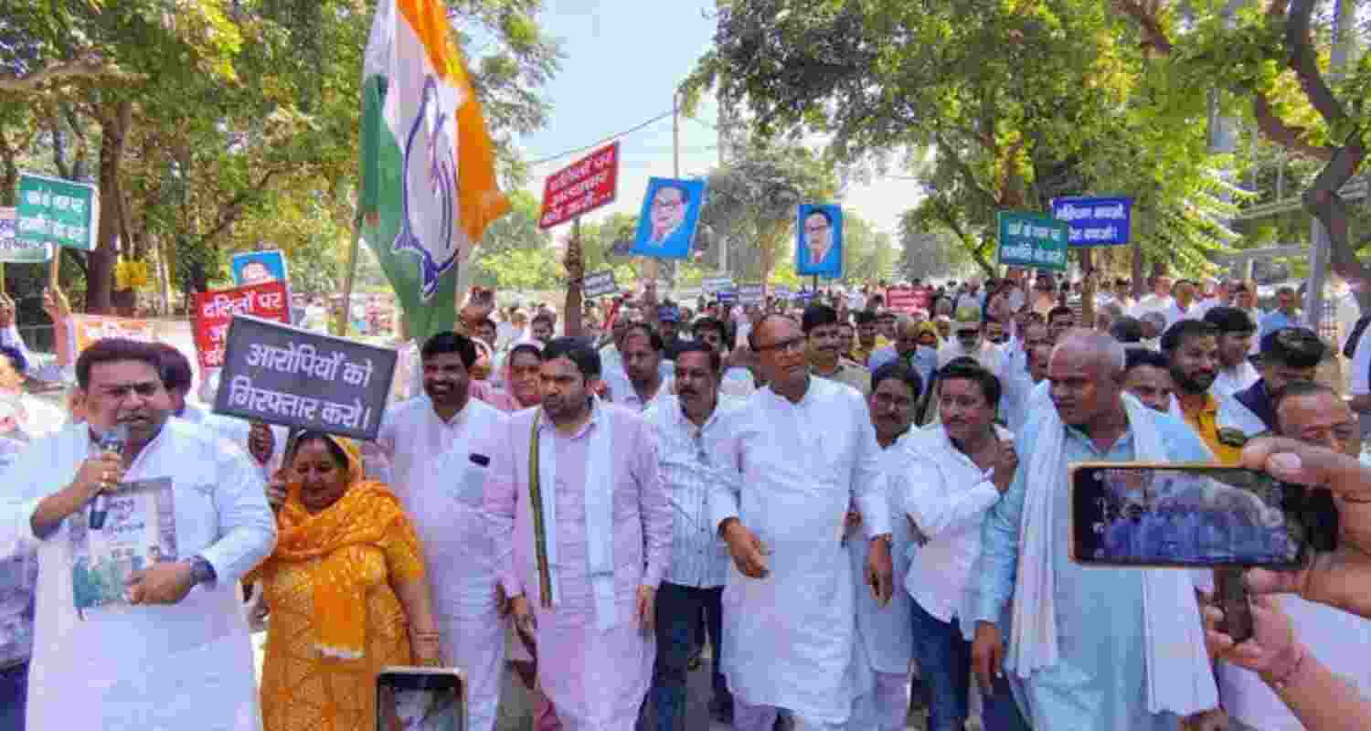 Congress workers take out a protest march in Rewari. Congress workers take out a protest march in Rewari.