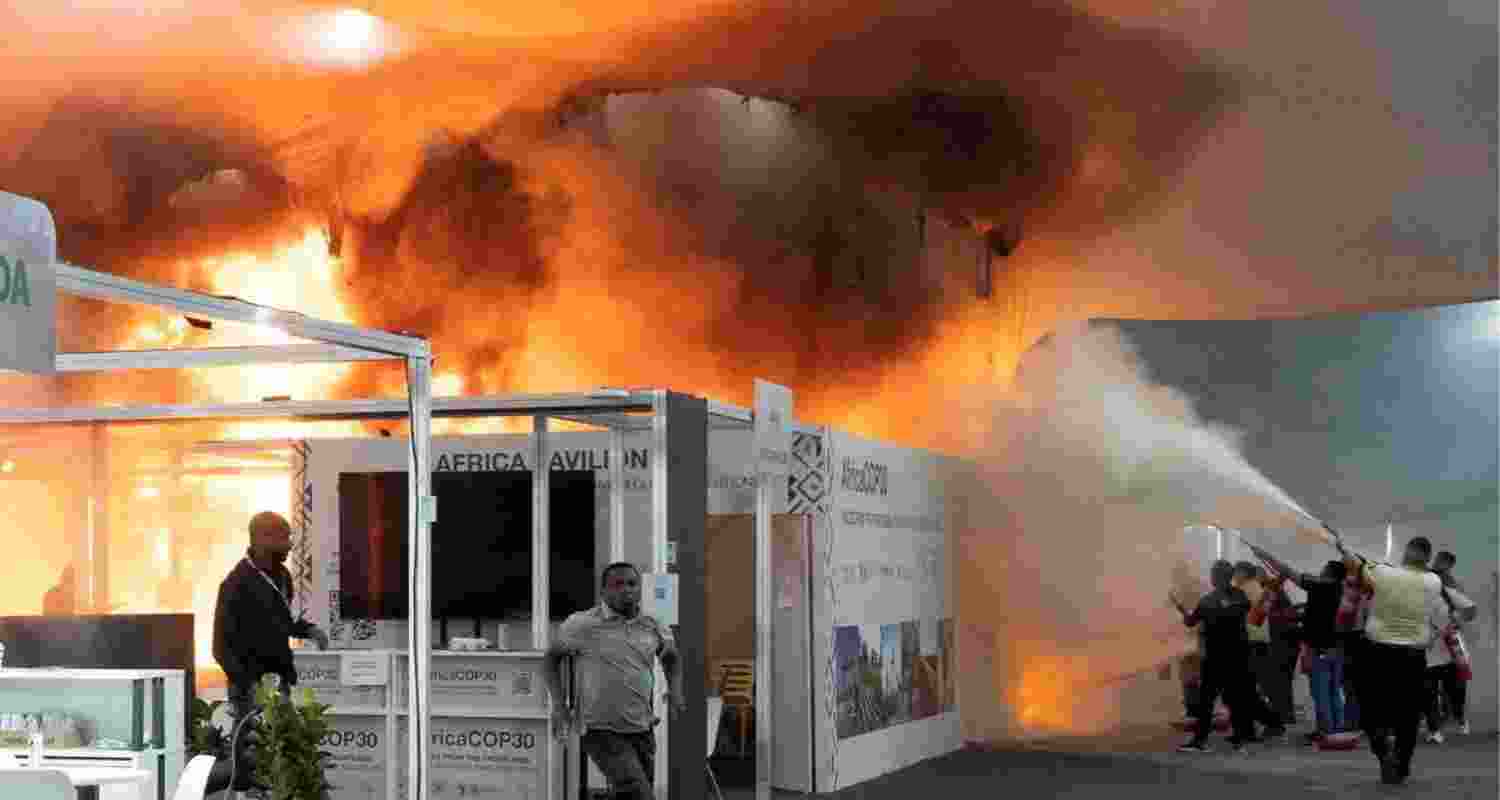 People use fire extinguishers to put out a fire at the Pavilion of Countries in the Blue Zone at the United Nations Climate Change Conference (COP30) in Belem in Brazil on Thursday. People use fire extinguishers to put out a fire at the Pavilion of Countries in the Blue Zone at the United Nations Climate Change Conference (COP30) in Belem in Brazil on Thursday.