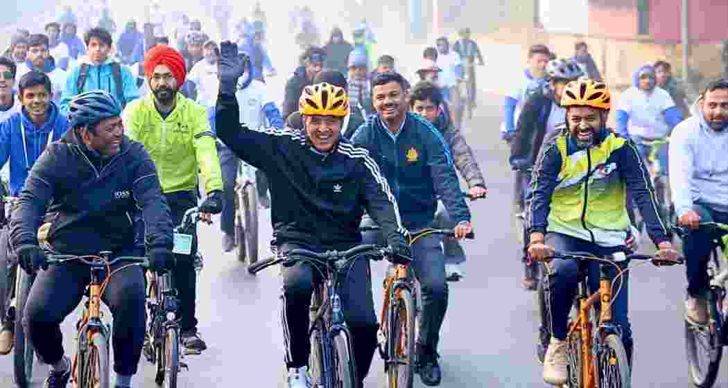 Sports Minister Mansukh Mandaviya (C) cycles alongside Leander Paes (L) and Pullela Gopichand (R) during the 56th edition of the Fit India initiative, ‘Sundays on Cycle’, in New Delhi on Sunday. Sports Minister Mansukh Mandaviya (C) cycles alongside Leander Paes (L) and Pullela Gopichand (R) during the 56th edition of the Fit India initiative, ‘Sundays on Cycle’, in New Delhi on Sunday.