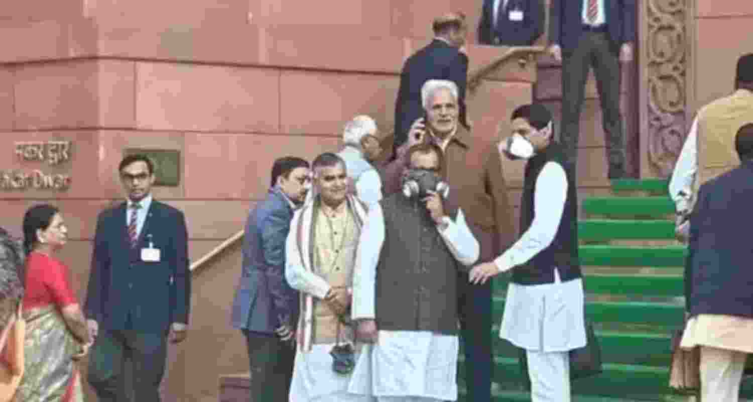 Opposition MPs wear gas masks in Parliament to protest Opposition MPs wear gas masks in Parliament to protest