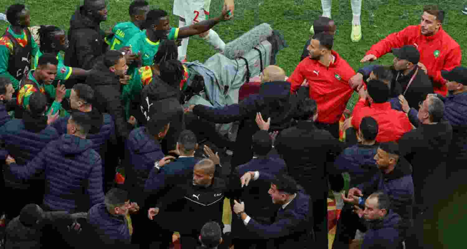 A file photograph of Senegal and Morocco players indulging in a heated argument as security officials try to intervene during the African Cup final. A file photograph of Senegal and Morocco players indulging in a heated argument as security officials try to intervene during the African Cup final.