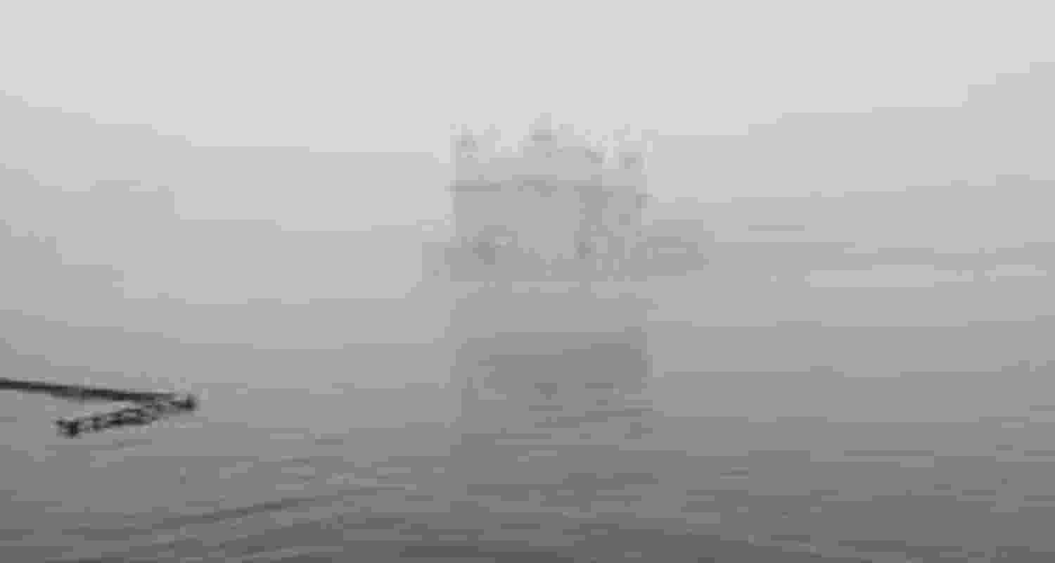 A file photograph of the Golden Temple in Amritsar shrouded in fog. A file photograph of the Golden Temple in Amritsar shrouded in fog.
