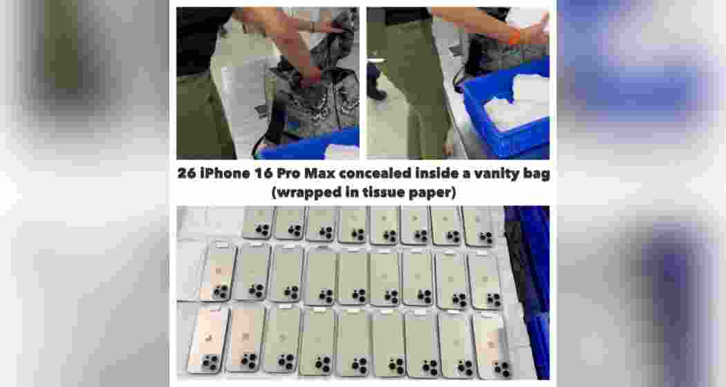 A photo released by Delhi Customs shows the 26 iPhone 16 Pro Max devices seized from a woman passenger at the international airport, concealed inside her vanity bag. A photo released by Delhi Customs shows the 26 iPhone 16 Pro Max devices seized from a woman passenger at the international airport, concealed inside her vanity bag.