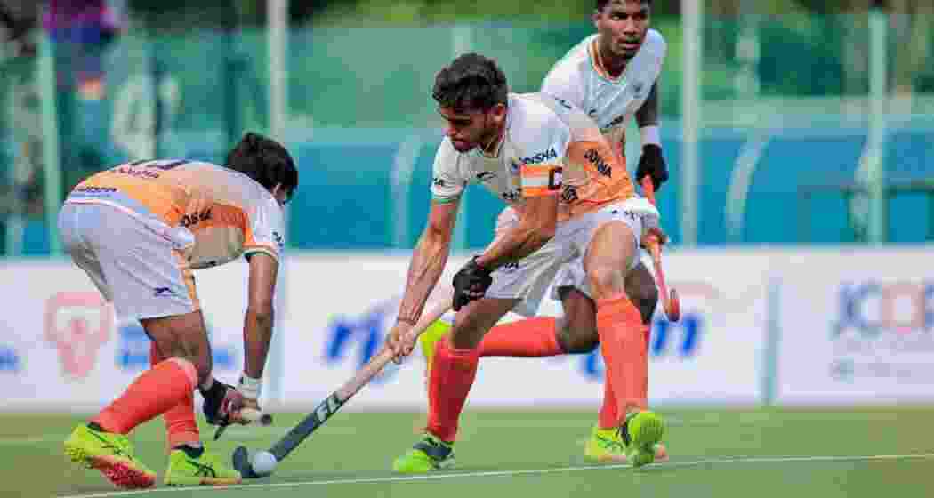 Indian junior hockey players in action during the match versus New Zealand. Indian junior hockey players in action during the match versus New Zealand.