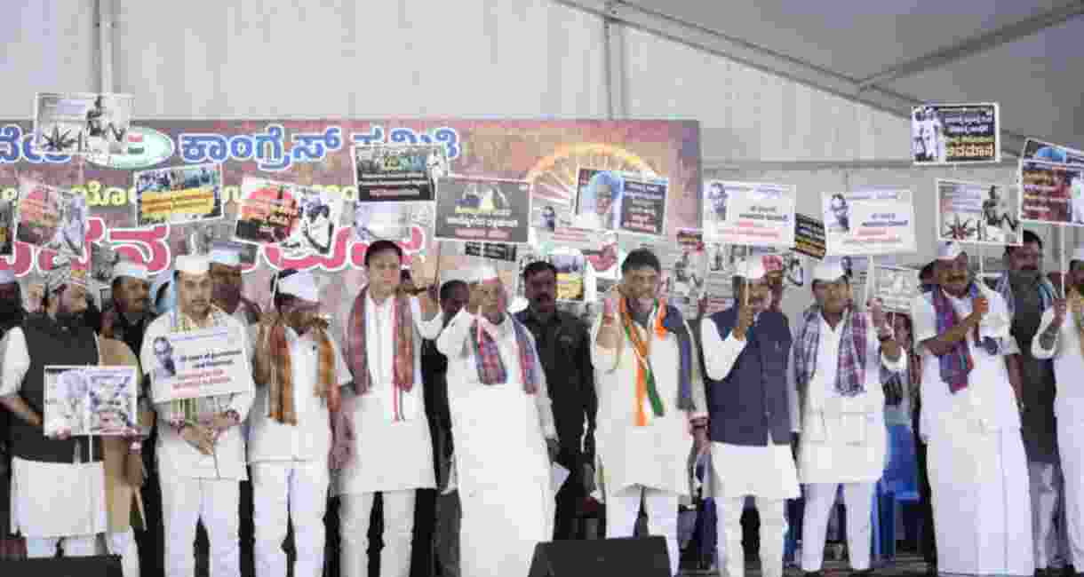 Karnataka CM Siddaramaiah and Deputy CM DK Shivakumar joined by AICC General Secretary Randeep Singh Surjewala and a sea of party workers participated in "Raj Bhavan Chalo" march against MGNREGA repeal. Karnataka CM Siddaramaiah and Deputy CM DK Shivakumar joined by AICC General Secretary Randeep Singh Surjewala and a sea of party workers participated in "Raj Bhavan Chalo" march against MGNREGA repeal.
