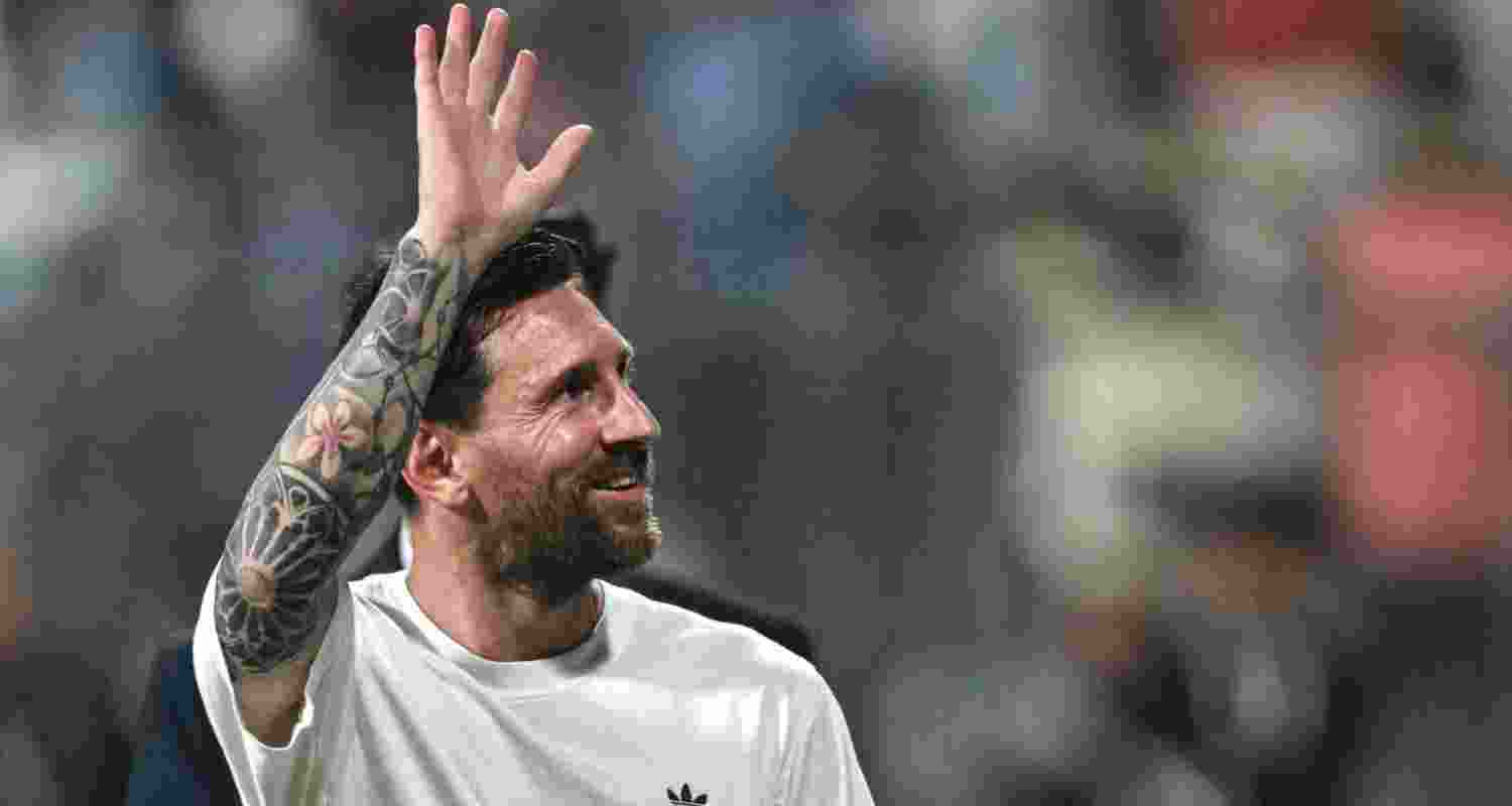 Lionel Messi waving at fans during the Delhi leg of his G.O.A.T. India Tour at the Feroze Shah Kotla Stadium in New Delhi on Monday. Lionel Messi waving at fans during the Delhi leg of his G.O.A.T. India Tour at the Feroze Shah Kotla Stadium in New Delhi on Monday.