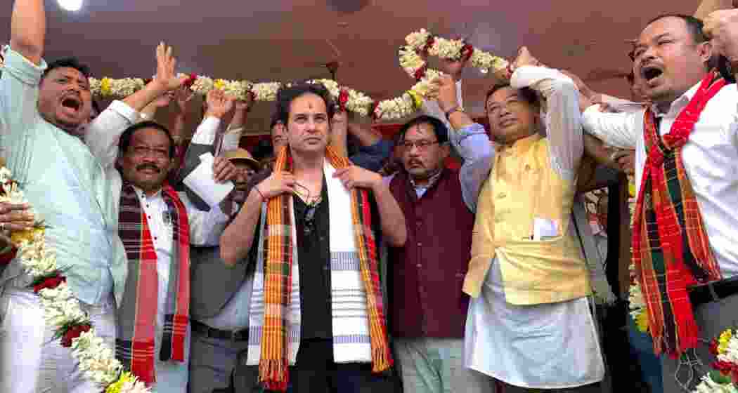 Tipra Motha Party supremo Pradyot Debbarma being felicitated with a garland by party and local leaders in Agartala. Tipra Motha Party supremo Pradyot Debbarma being felicitated with a garland by party and local leaders in Agartala.