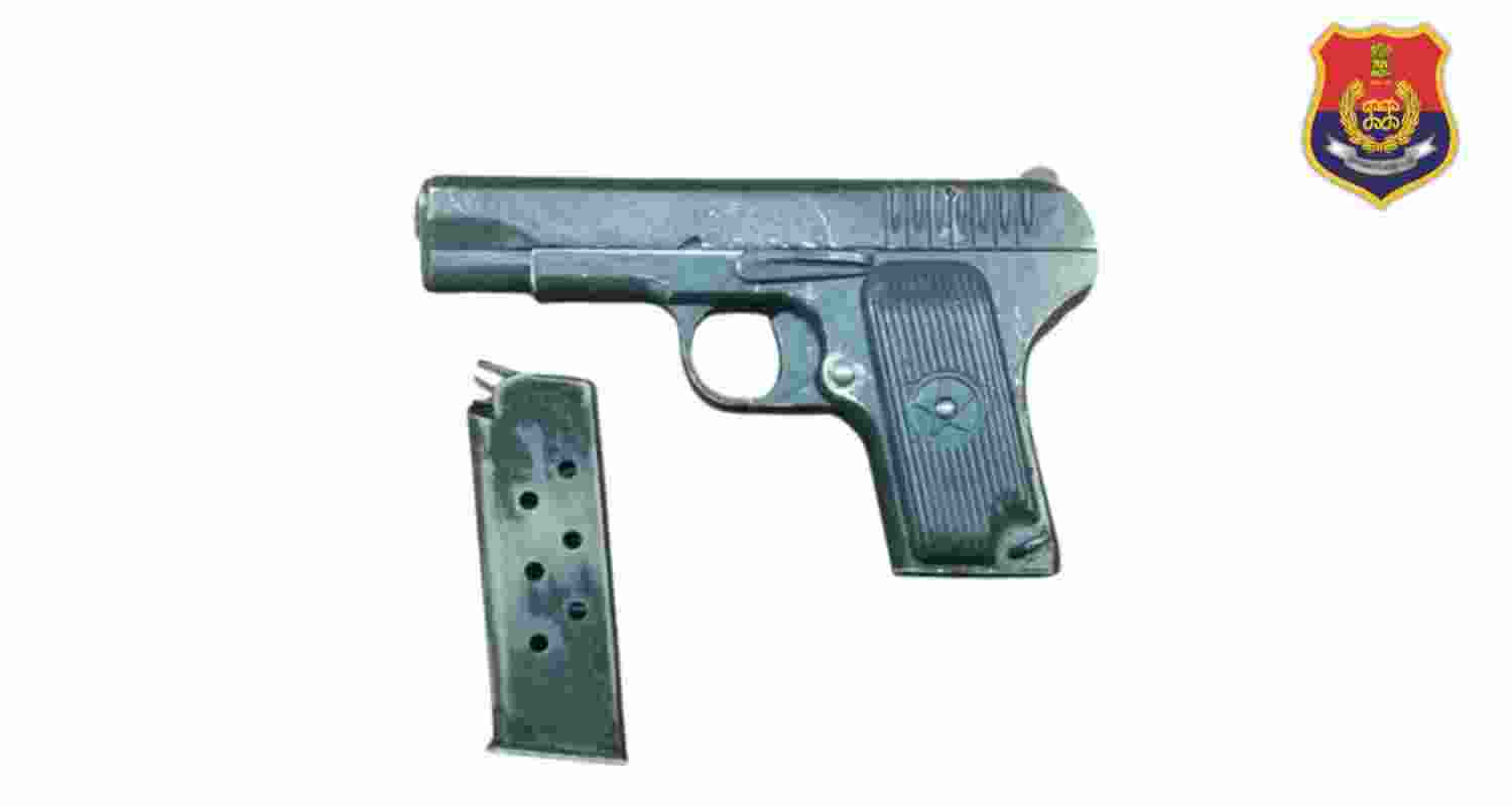 .30 bore pistol recovered from the accused. .30 bore pistol recovered from the accused.