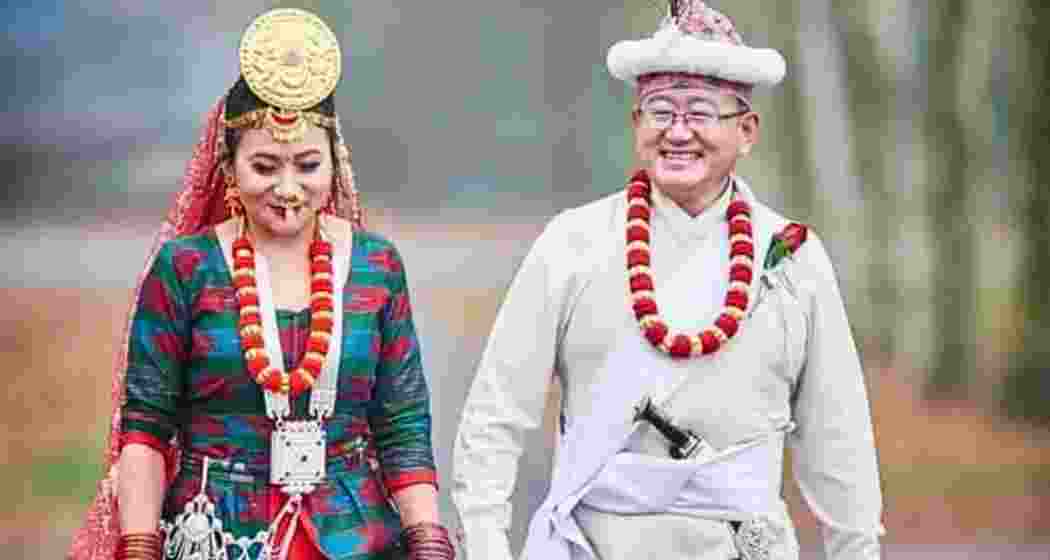 A Sikkimese couple dressed in their traditional attire. A Sikkimese couple dressed in their traditional attire.
