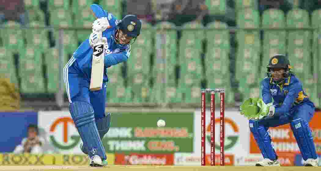 India's Smriti Mandhana plays a shot during the fourth T20 International cricket match of a series between India Women and Sri Lanka Women, at Greenfield International Stadium, in Thiruvananthapuram, Kerala on Sunday.. India's Smriti Mandhana plays a shot during the fourth T20 International cricket match of a series between India Women and Sri Lanka Women, at Greenfield International Stadium, in Thiruvananthapuram, Kerala on Sunday..