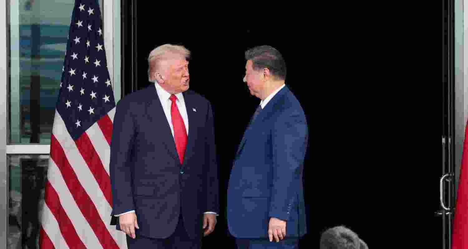 U.S. President Donald Trump and Chinese President Xi Jinping talk as they leave after a bilateral meeting at Gimhae International Airport, on the sidelines of the Asia-Pacific Economic Cooperation summit, in Busan, South Korea. (File Photo) U.S. President Donald Trump and Chinese President Xi Jinping talk as they leave after a bilateral meeting at Gimhae International Airport, on the sidelines of the Asia-Pacific Economic Cooperation summit, in Busan, South Korea. (File Photo)