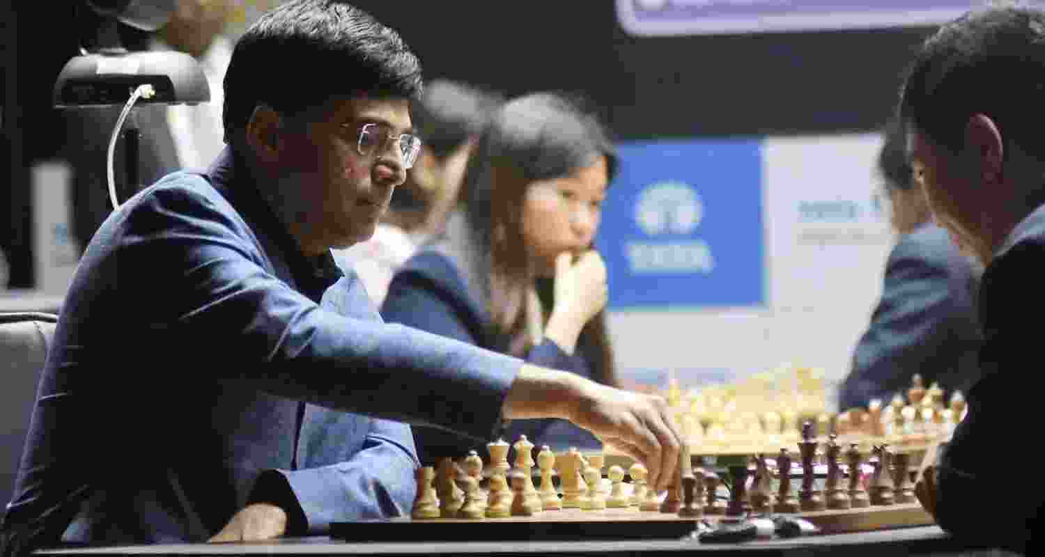 Viswanathan Anand, who started the day on joint lead with Hans Niemann at 2.5 points, suffered a loss in his very first game as he went down to Arjun Erigaisi, but bounced back with two back-to-back wins. Viswanathan Anand, who started the day on joint lead with Hans Niemann at 2.5 points, suffered a loss in his very first game as he went down to Arjun Erigaisi, but bounced back with two back-to-back wins.