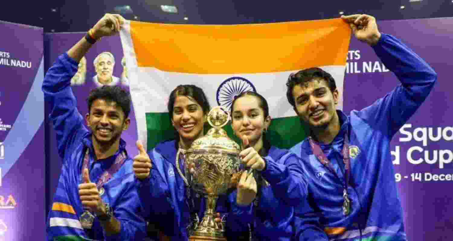 An elated Indian team posing with the Squash World Cup trophy in Chennai. An elated Indian team posing with the Squash World Cup trophy in Chennai.