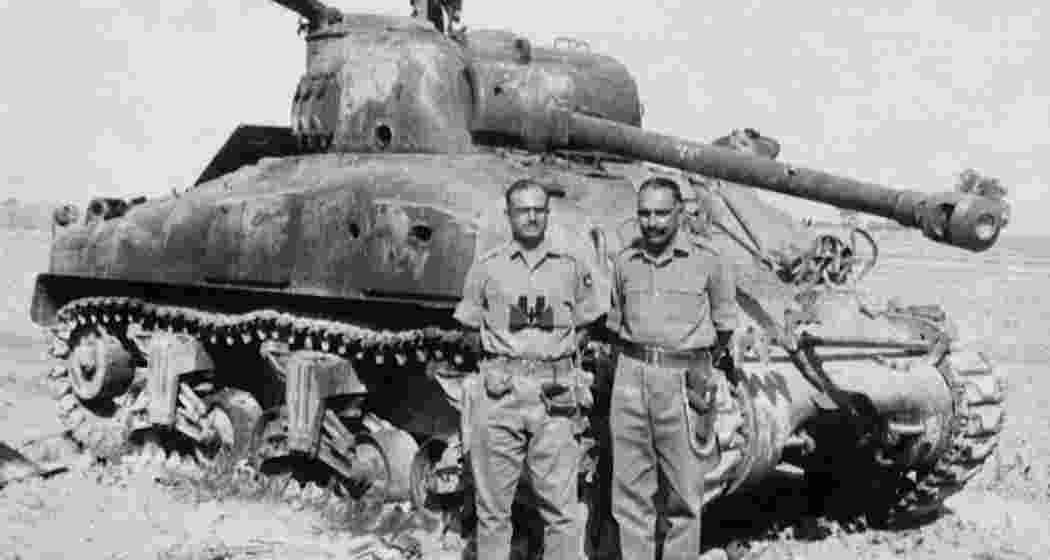 Indian soldiers with a destroyed Pakistani M4A1 Sherman tank. Indian soldiers with a destroyed Pakistani M4A1 Sherman tank.