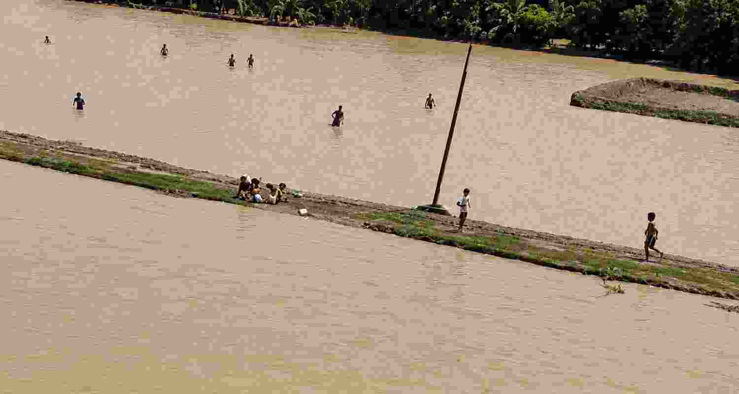Severe flooding submerged Sivasagar town in Assam, damaging homes and shops while leaving residents facing food, water and electricity shortages. Severe flooding submerged Sivasagar town in Assam, damaging homes and shops while leaving residents facing food, water and electricity shortages.