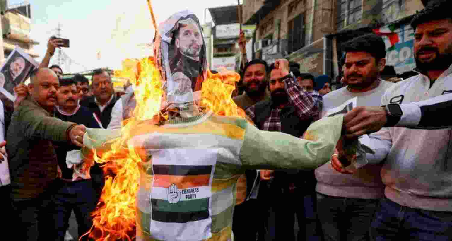 BJP Yuva Morcha activists burn an effigy of Congress leader Rahul Gandhi during a protest outside the party office against the shirtless demonstration by Indian Youth Congress workers at the AI Impact Summit in New Delhi, in Jammu, Saturday. BJP Yuva Morcha activists burn an effigy of Congress leader Rahul Gandhi during a protest outside the party office against the shirtless demonstration by Indian Youth Congress workers at the AI Impact Summit in New Delhi, in Jammu, Saturday.