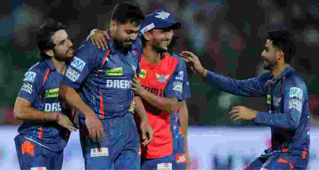 Team-mates cheer as Avesh Khan celebrates after delivering a match-winning final over against Rajasthan Royals, sealing a thrilling two-run win for Lucknow Super Giants at Sawai Mansingh Stadium. Team-mates cheer as Avesh Khan celebrates after delivering a match-winning final over against Rajasthan Royals, sealing a thrilling two-run win for Lucknow Super Giants at Sawai Mansingh Stadium.
