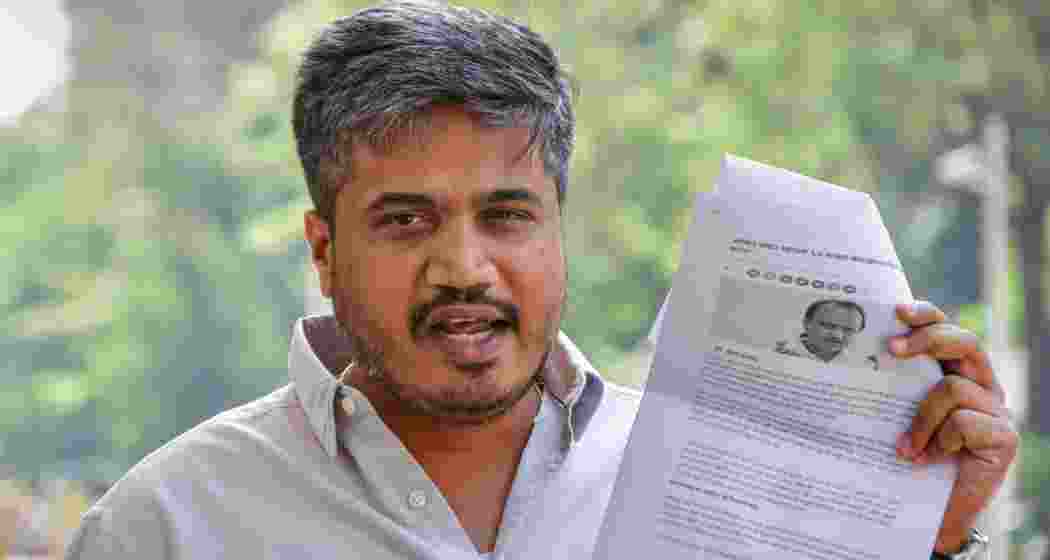 File photo of NCP (SP) leader Rohit Pawar. (Image: PTI) File photo of NCP (SP) leader Rohit Pawar. (Image: PTI)