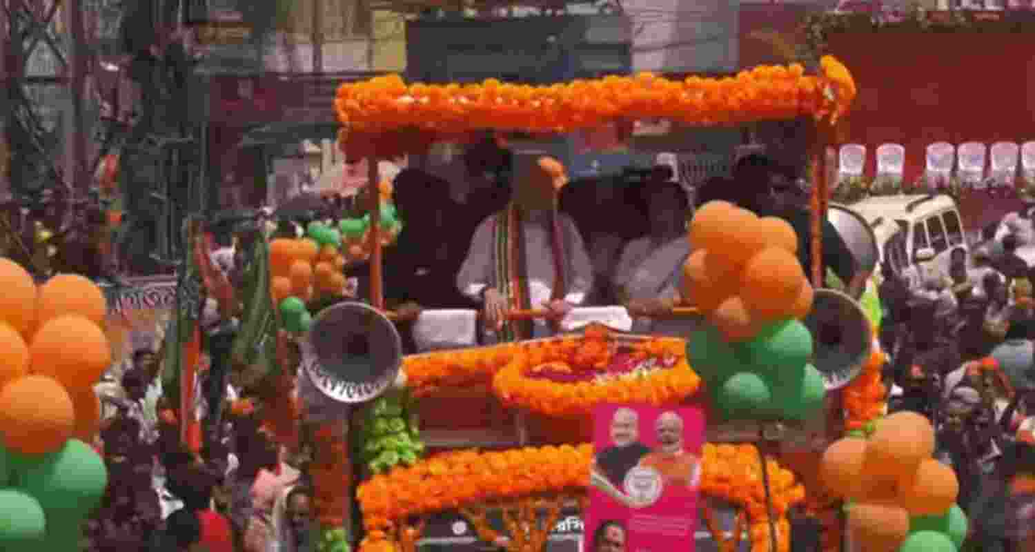 Amit Shah addresses a roadshow in Malda Amit Shah addresses a roadshow in Malda
