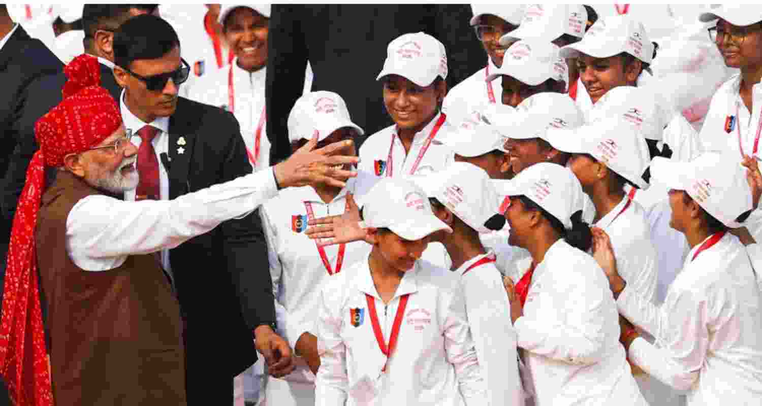 Prime Minister Narendra Modi interacting with school students during the Independence Day celebrations in New Delhi on Saturday. Prime Minister Narendra Modi interacting with school students during the Independence Day celebrations in New Delhi on Saturday.