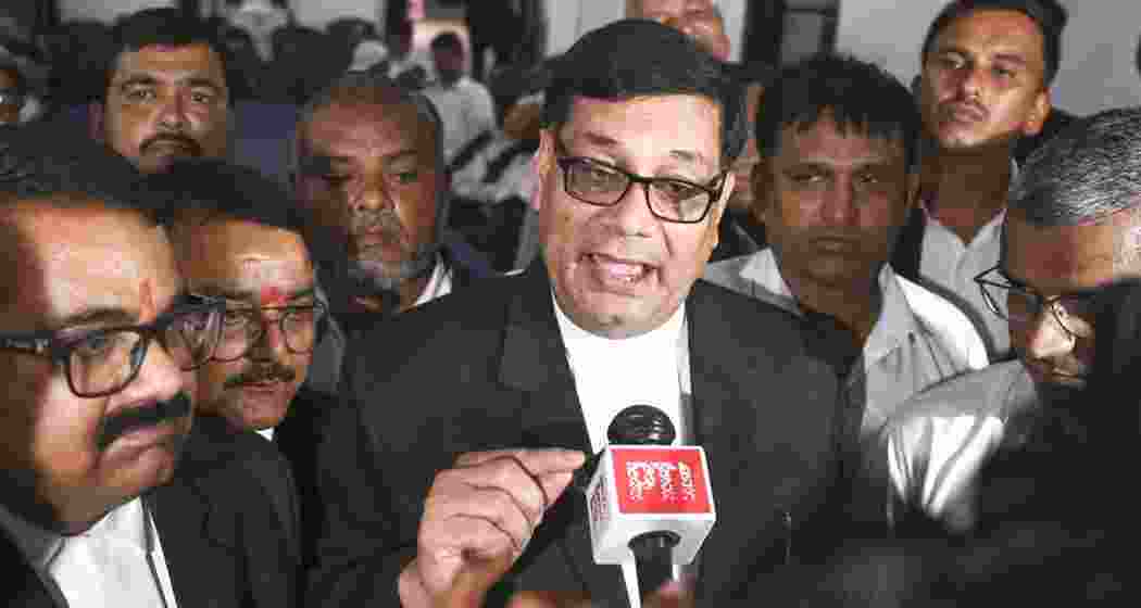 Faizabad Bar Association president Kalika Prasad Mishra addresses the media at the Faizabad District Court, in Ayodhya, Uttar Pradesh, on Monday. Faizabad Bar Association president Kalika Prasad Mishra addresses the media at the Faizabad District Court, in Ayodhya, Uttar Pradesh, on Monday.