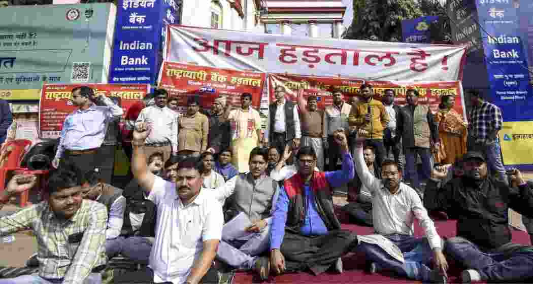 Members of a joint forum of central trade unions shout slogans during a nationwide strike called to protest government policies, in Patna, Bihar on Thursday. Members of a joint forum of central trade unions shout slogans during a nationwide strike called to protest government policies, in Patna, Bihar on Thursday.