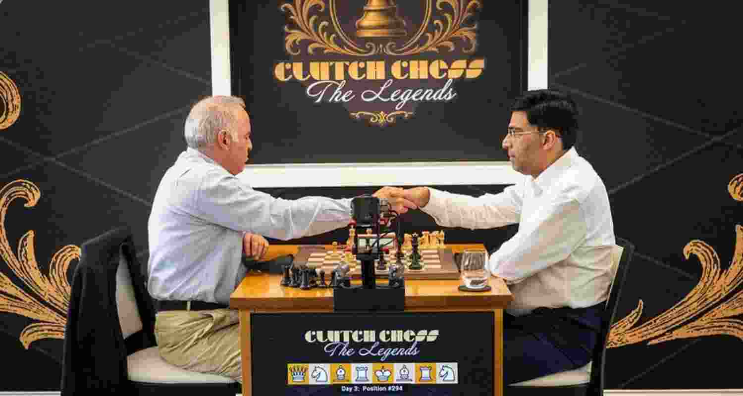 Garry Kasparov and Viswanathan Anand shaking hands after the match. Garry Kasparov and Viswanathan Anand shaking hands after the match.