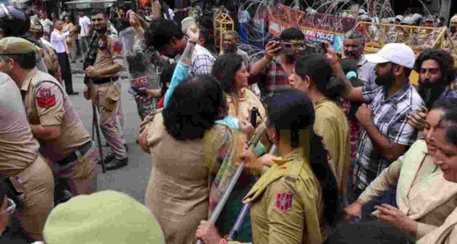 Congress leaders and workers march in Jammu on Sunday, demanding the early restoration of statehood to Jammu and Kashmir. Congress leaders and workers march in Jammu on Sunday, demanding the early restoration of statehood to Jammu and Kashmir.