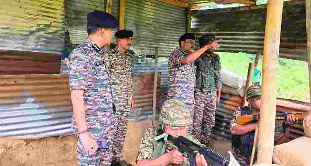 CRPF Director General Gyanendra Pratap Singh interacts with CRPF personnel deployed in violence-hit Manipur during his visit to review the security situation and assess operational preparedness. CRPF Director General Gyanendra Pratap Singh interacts with CRPF personnel deployed in violence-hit Manipur during his visit to review the security situation and assess operational preparedness.