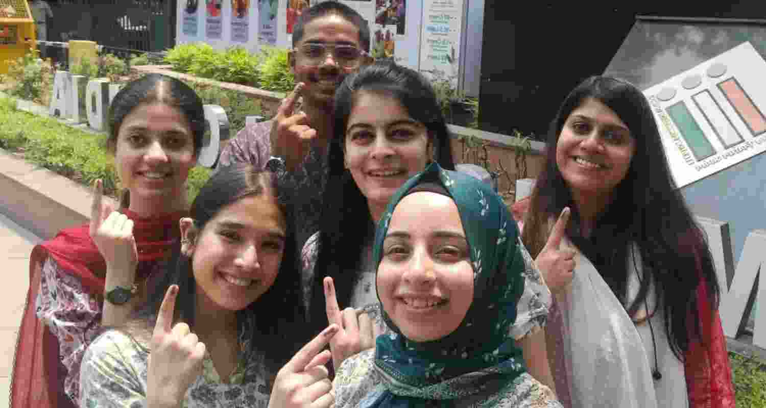 First-time voters take pride in casting vote. First-time voters take pride in casting vote.