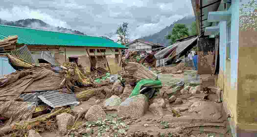 Widespread devastation caused by flash floods and heavy rainfall at NEEPCO colony, in Keyi Panyor on Wednesday. Widespread devastation caused by flash floods and heavy rainfall at NEEPCO colony, in Keyi Panyor on Wednesday.