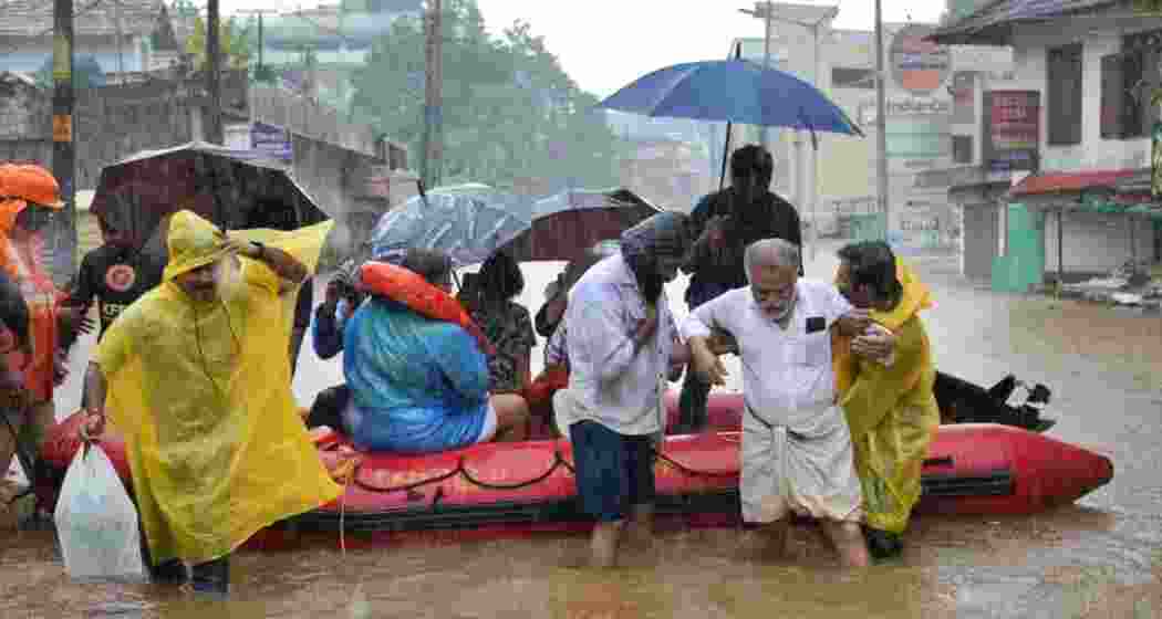 Rescue work under way at the flooded Ranni town in Pathanamthitta on Saturday. Rescue work under way at the flooded Ranni town in Pathanamthitta on Saturday.
