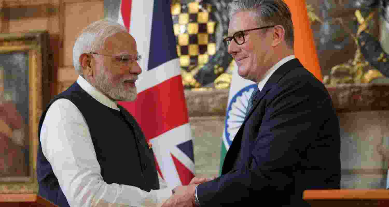 Prime Minister Narendra Modi shakes hands with Britain's Prime Minister Keir Starmer after signing a free trade agreement in July last year. Prime Minister Narendra Modi shakes hands with Britain's Prime Minister Keir Starmer after signing a free trade agreement in July last year.