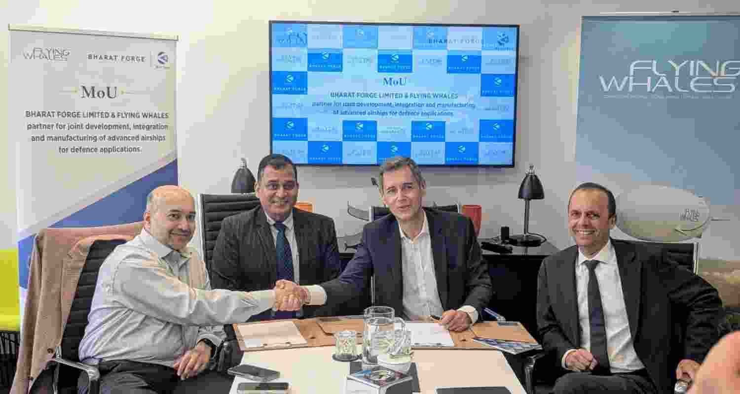 Officials of Bharat Forge Ltd and French-Canadian heavy-lift airship company Flying Whales signing the memorandum of understanding. Officials of Bharat Forge Ltd and French-Canadian heavy-lift airship company Flying Whales signing the memorandum of understanding.