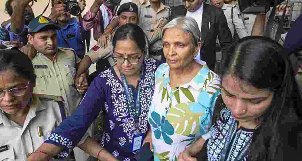 Prime accused Giribala Singh comes out of a local court after being remanded to five-days CBI custody in connection with the death case of her daughter-in-law Twisha Sharma, in Bhopal, Madhya Pradesh, on Friday. Prime accused Giribala Singh comes out of a local court after being remanded to five-days CBI custody in connection with the death case of her daughter-in-law Twisha Sharma, in Bhopal, Madhya Pradesh, on Friday.