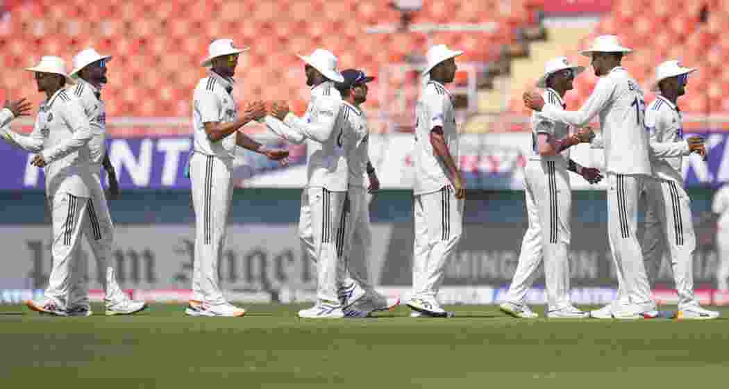Indian player shake hands after team's win on day three of a Test cricket match between India and Afghanistan, in Mullanpur, on Monday. Indian player shake hands after team's win on day three of a Test cricket match between India and Afghanistan, in Mullanpur, on Monday.