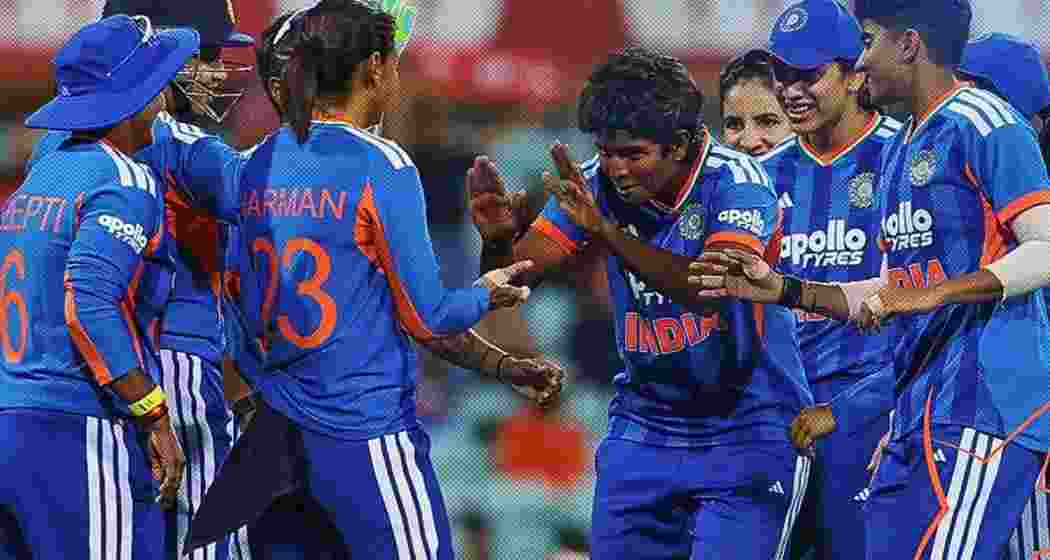 Indian women players celebrate after taking a wicket during an international fixture. Indian women players celebrate after taking a wicket during an international fixture.