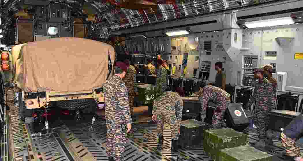 Army personnel load humanitarian aid and the BHISHM field hospital aboard an Indian Air Force C-17 aircraft before its departure for earthquake-hit Venezuela under Operation Amistad. Army personnel load humanitarian aid and the BHISHM field hospital aboard an Indian Air Force C-17 aircraft before its departure for earthquake-hit Venezuela under Operation Amistad.