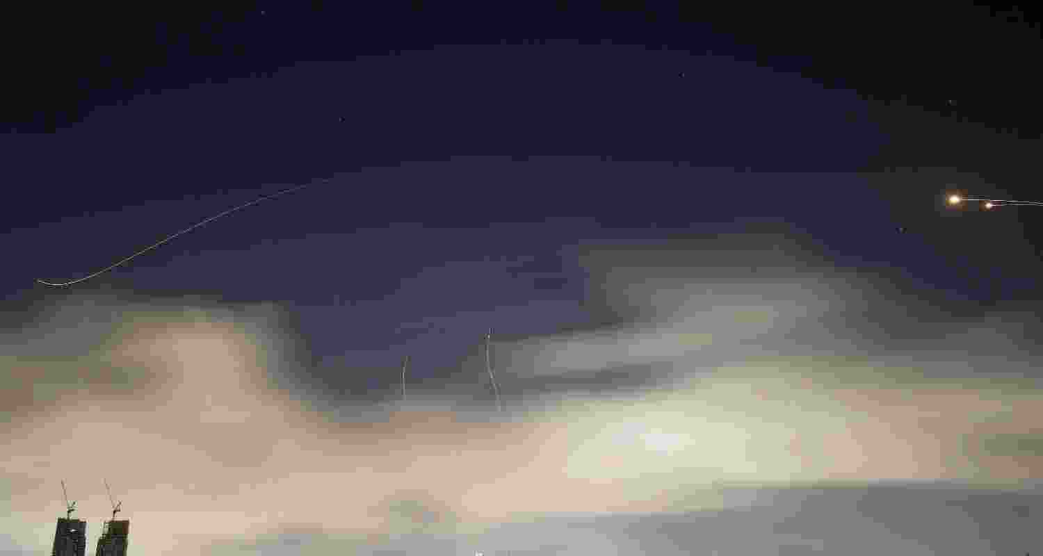 Israeli air defense system fires to intercept missiles during an Iranian attack over Tel Aviv, Israel, early Sunday, March 15, 2026. Israeli air defense system fires to intercept missiles during an Iranian attack over Tel Aviv, Israel, early Sunday, March 15, 2026.