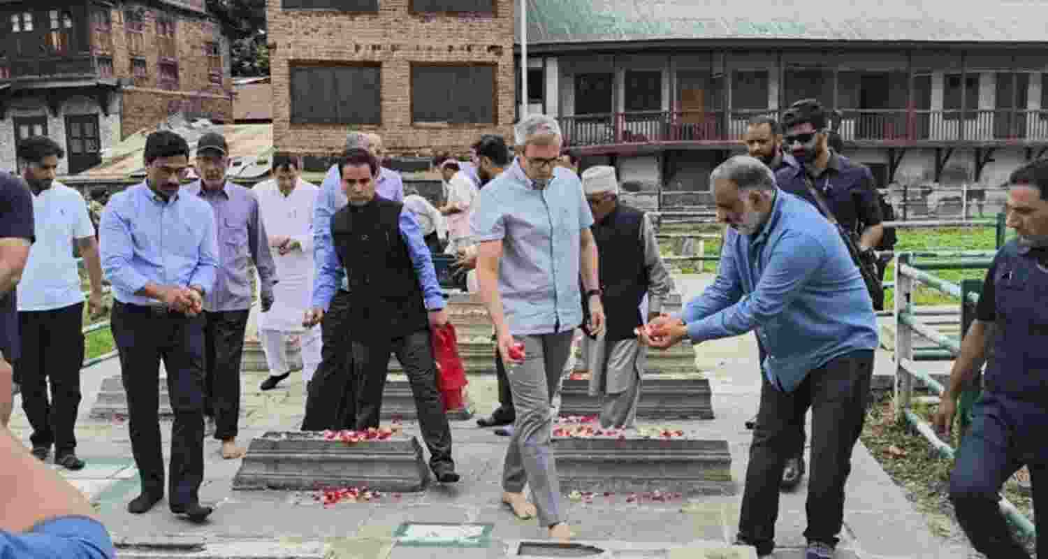 Jammu and Kashmir Chief Minister Omar Abdullah, National Conference chief Farooq Abdullah and others pay tribute to July 13 martyrs in Srinagar. Jammu and Kashmir Chief Minister Omar Abdullah, National Conference chief Farooq Abdullah and others pay tribute to July 13 martyrs in Srinagar.